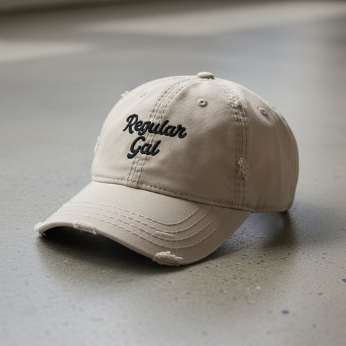 khaki distressed dad hat embroidered with the words regular gal