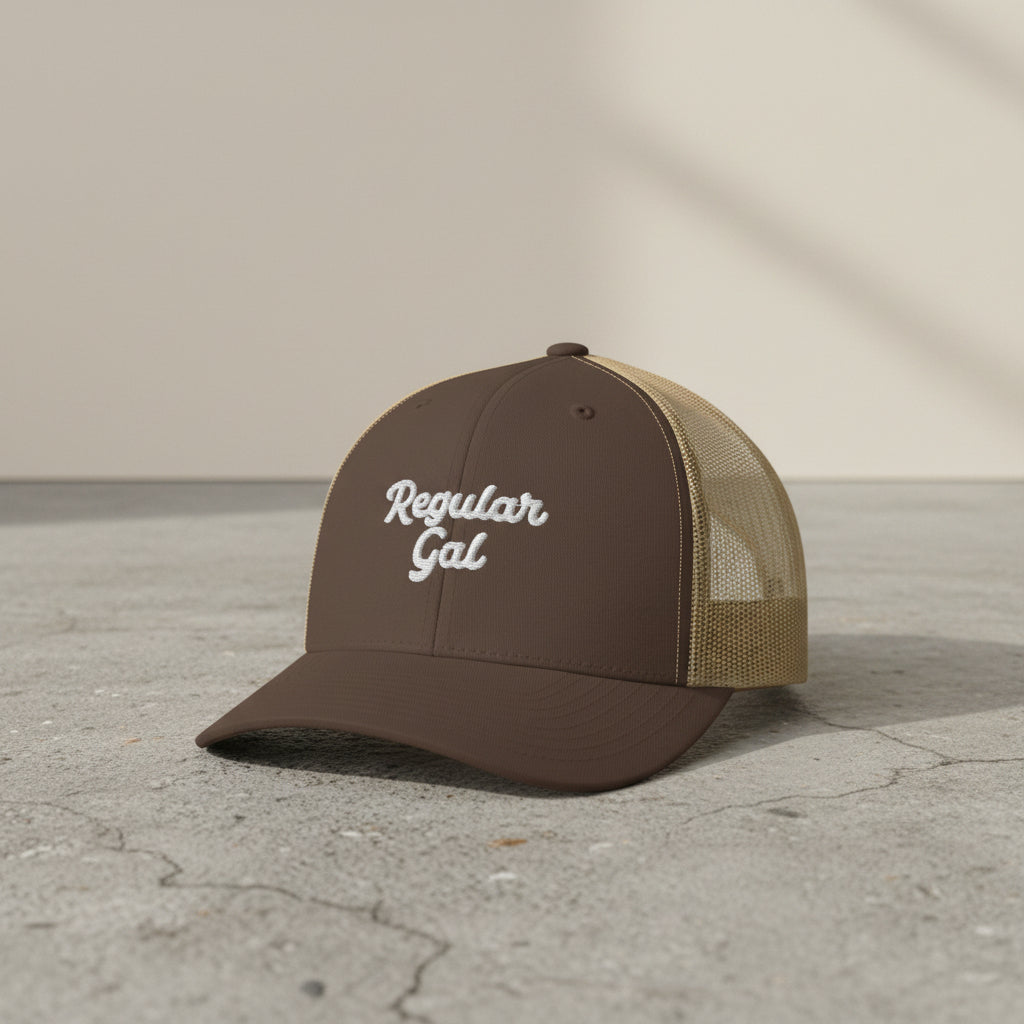 brown snapback cap with embroidered 'Regular Gal' text 
