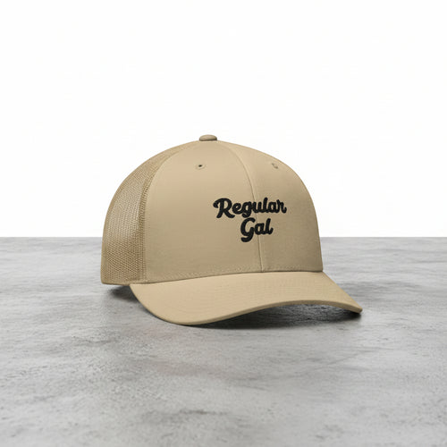 khaki snapback cap with embroidered 'Regular Gal' text 
