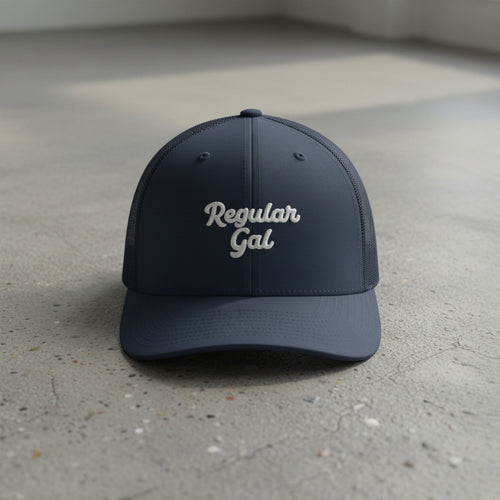 navy snapback cap with embroidered 'Regular Gal' text 