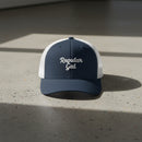 navy white snapback cap with embroidered 'Regular Gal' text 