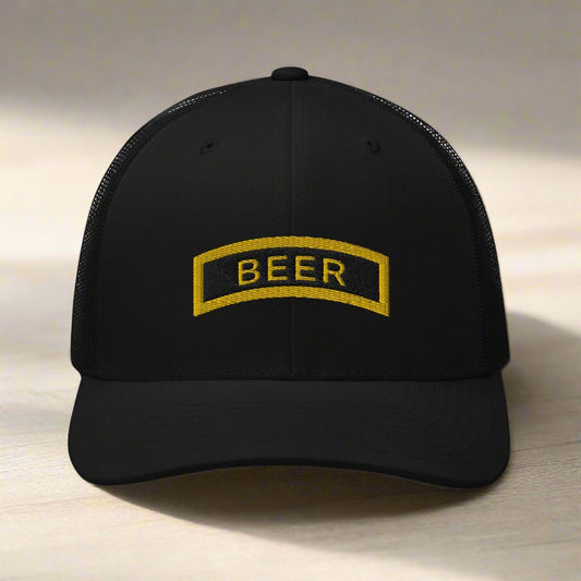 ranger school beer tab embroidered on a trucker hat.