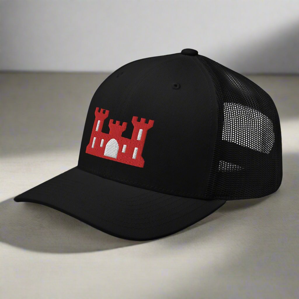 Army corps of engineers insignia on a snapback trucker hat.
