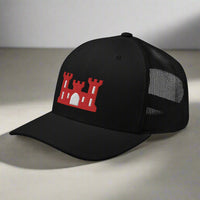 Army corps of engineers insignia on a snapback trucker hat.