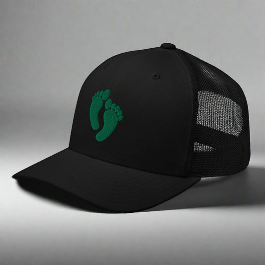 air force pararescue pj green feet embroidered on a snapback trucker hat.