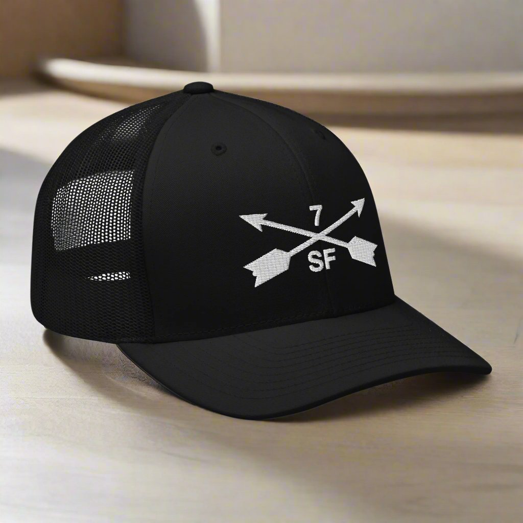 7th special forces group embroidered trucker hat. Embroidery design of two crossed arrows with a 7 above and SF below.