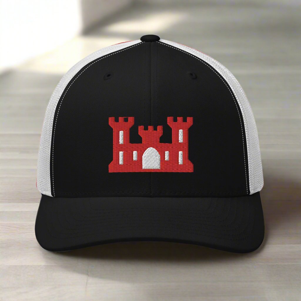 Army corps of engineers insignia on a snapback trucker hat.