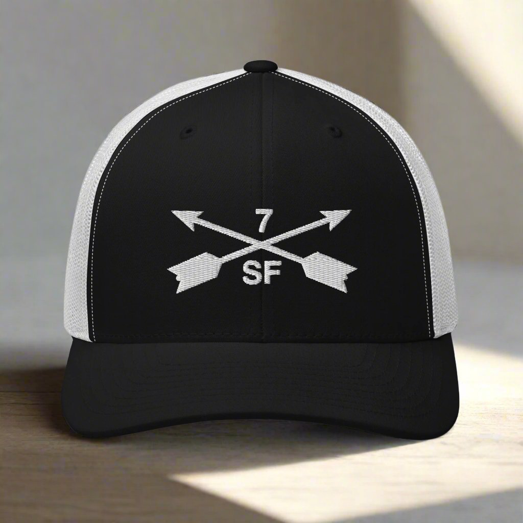 7th special forces group embroidered trucker hat. Embroidery design of two crossed arrows with a 7 above and SF below.