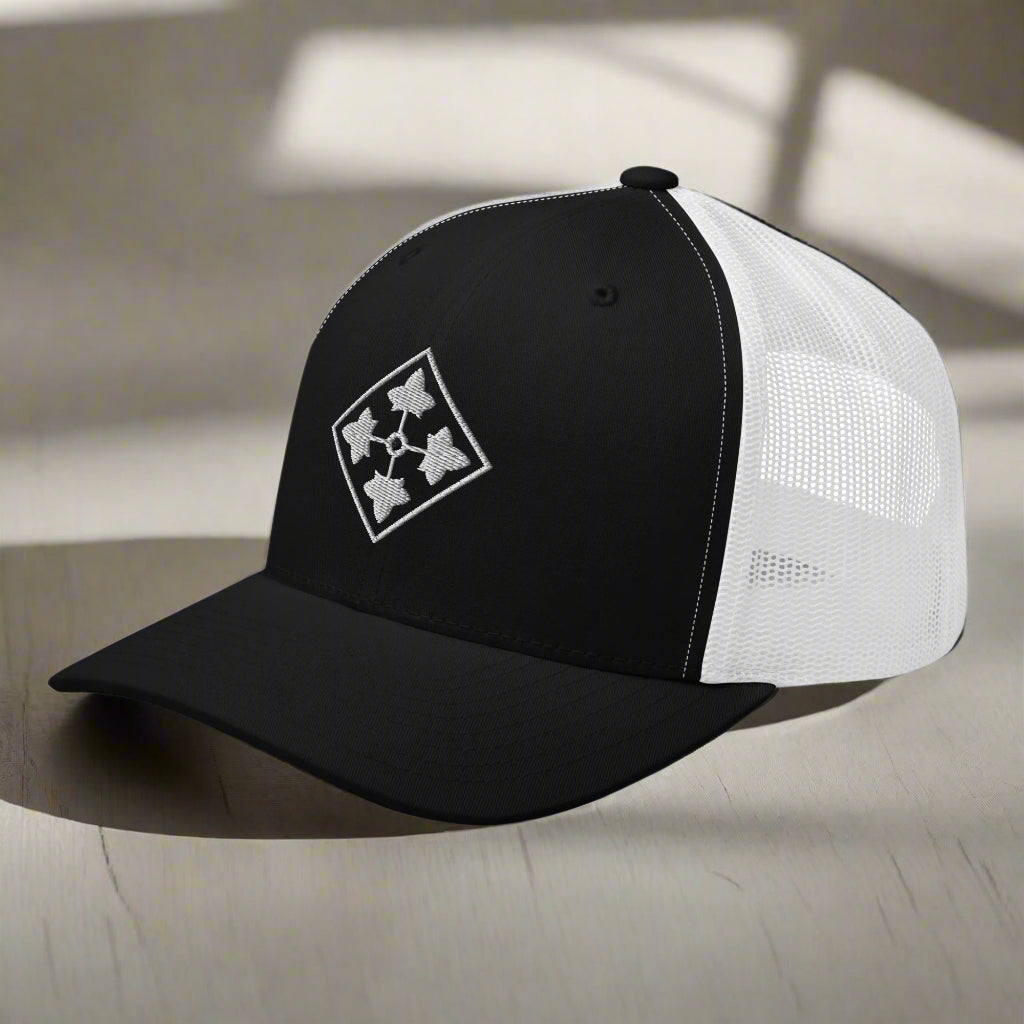 4th infantry division insignia embroidered on a snapback trucker hat