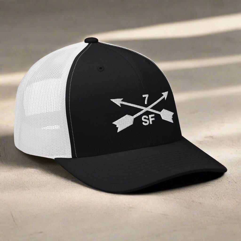 7th special forces group embroidered trucker hat. Embroidery design of two crossed arrows with a 7 above and SF below.