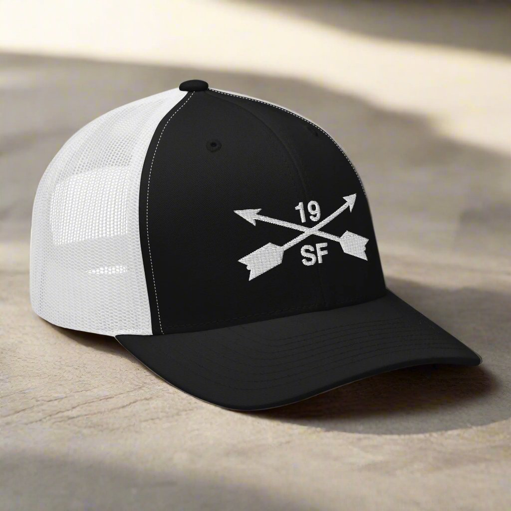 19th special forces group embroidered trucker hat. Embroidery design of two crossed arrows with a 19 above and SF below.