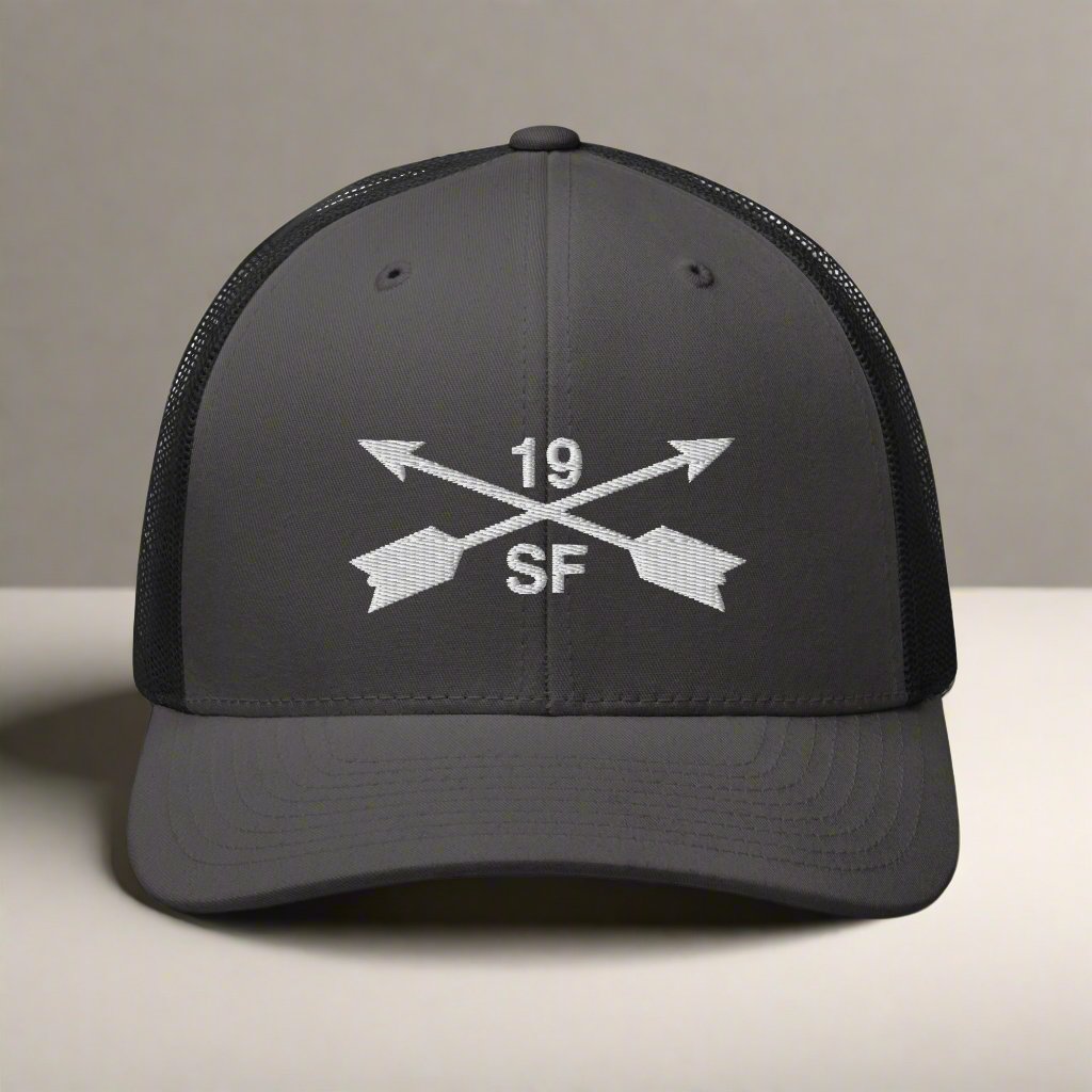 19th special forces group embroidered trucker hat. Embroidery design of two crossed arrows with a 19 above and SF below.