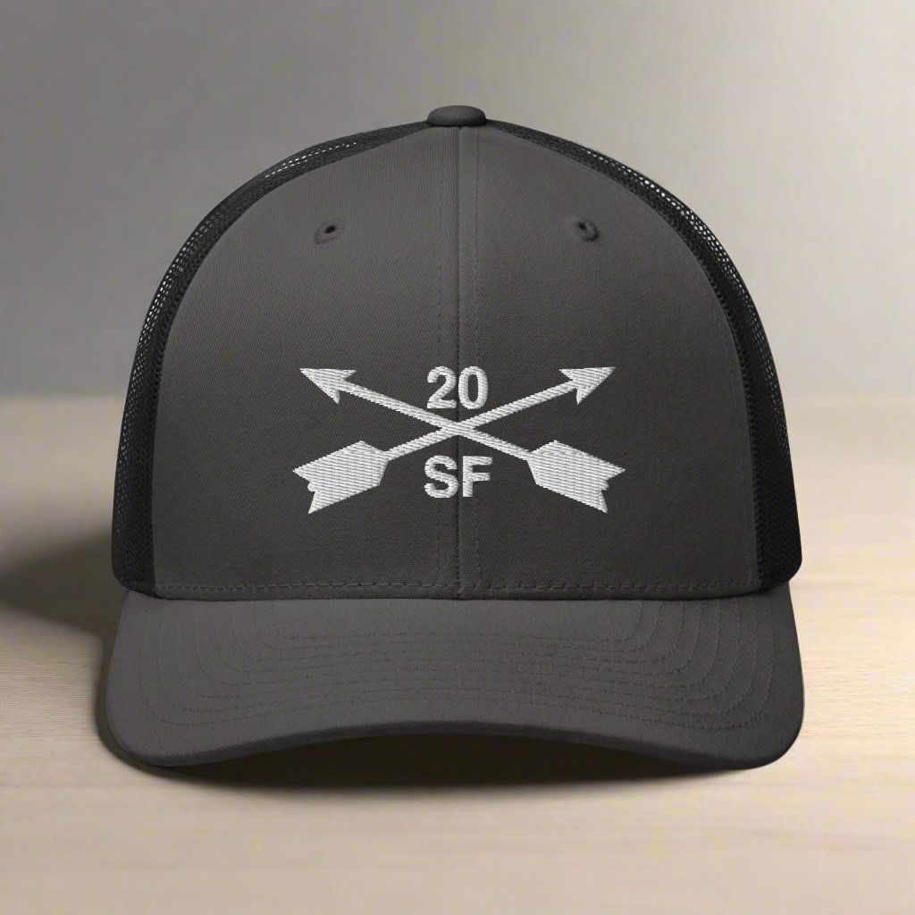 20th special forces group embroidered trucker hat. Embroidery design of two crossed arrows with a 20 above and SF below.