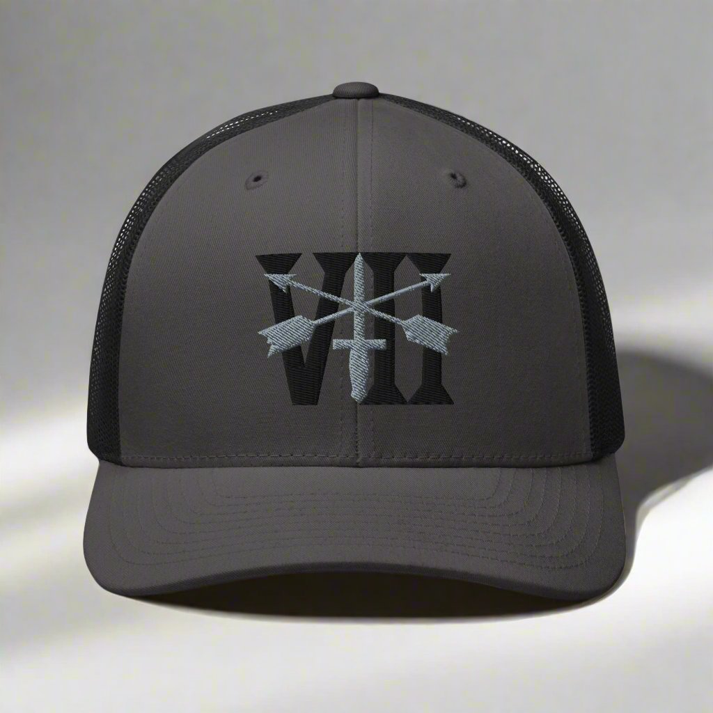 Snapback trucker hat embroidered with 7th special forces group roman numeral design