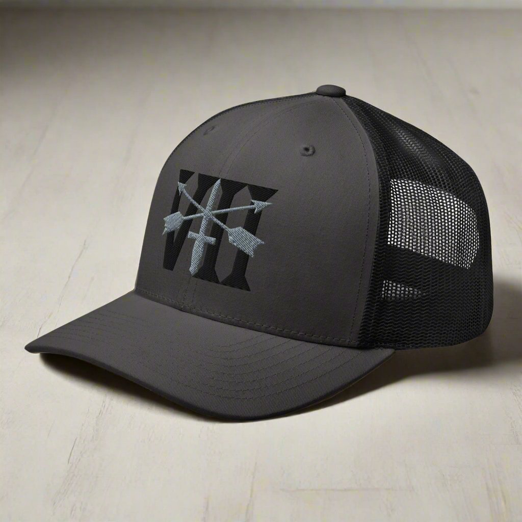 Snapback trucker hat embroidered with 7th special forces group roman numeral design