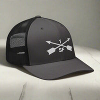 1st special forces group embroidered trucker hat with two crossed arrows and the 1 above and SF below.