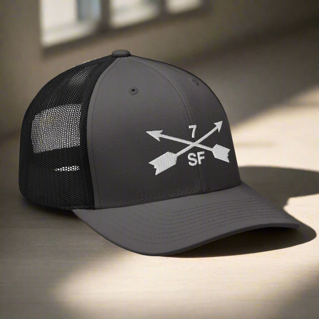 7th special forces group embroidered trucker hat. Embroidery design of two crossed arrows with a 7 above and SF below.