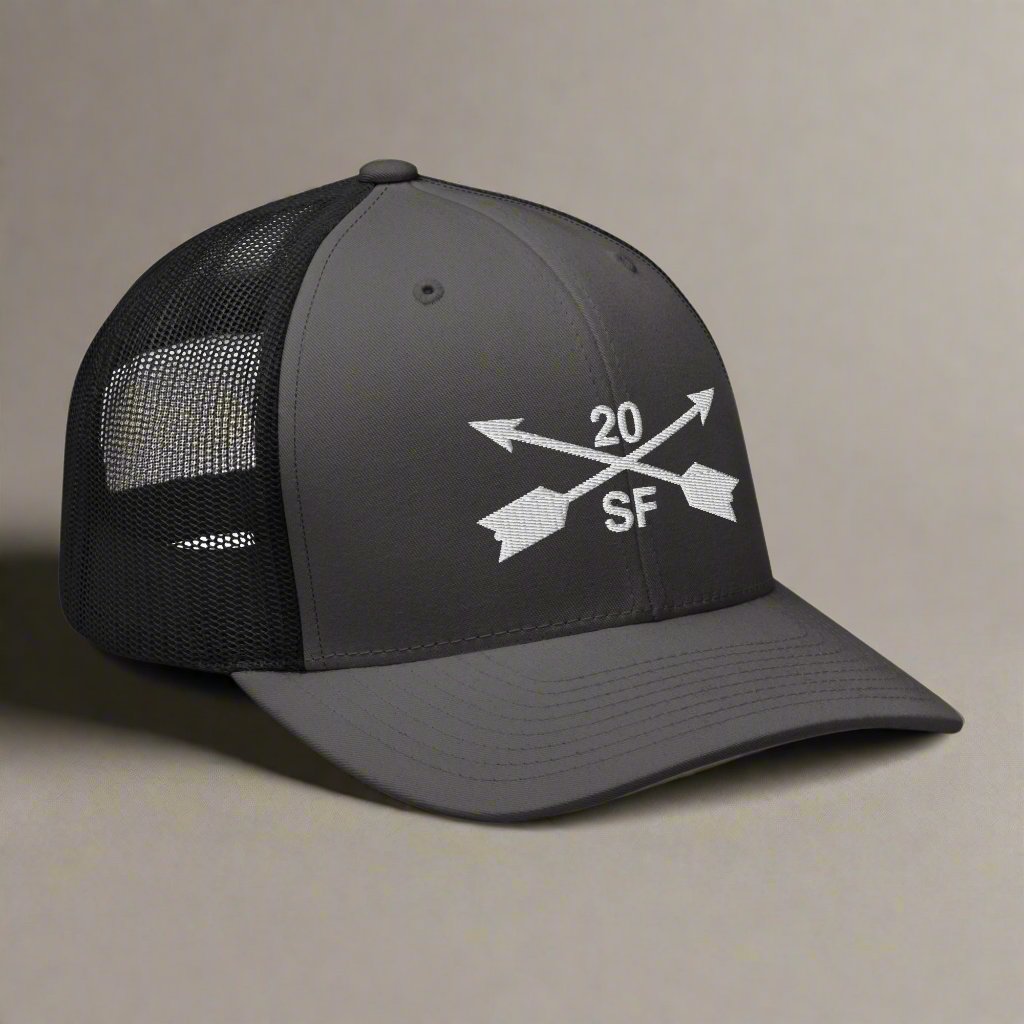 20th special forces group embroidered trucker hat. Embroidery design of two crossed arrows with a 20 above and SF below.