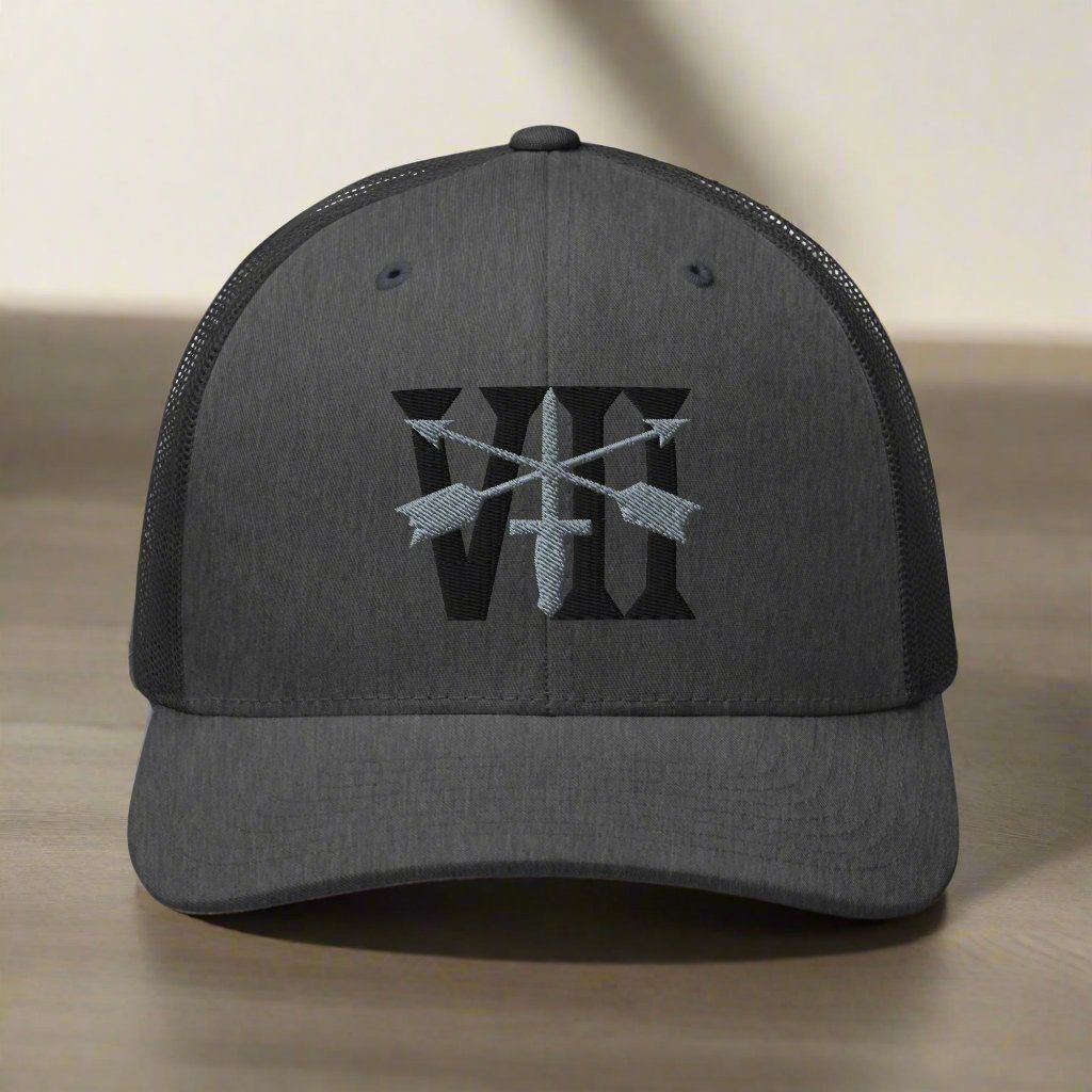 Snapback trucker hat embroidered with 7th special forces group roman numeral design