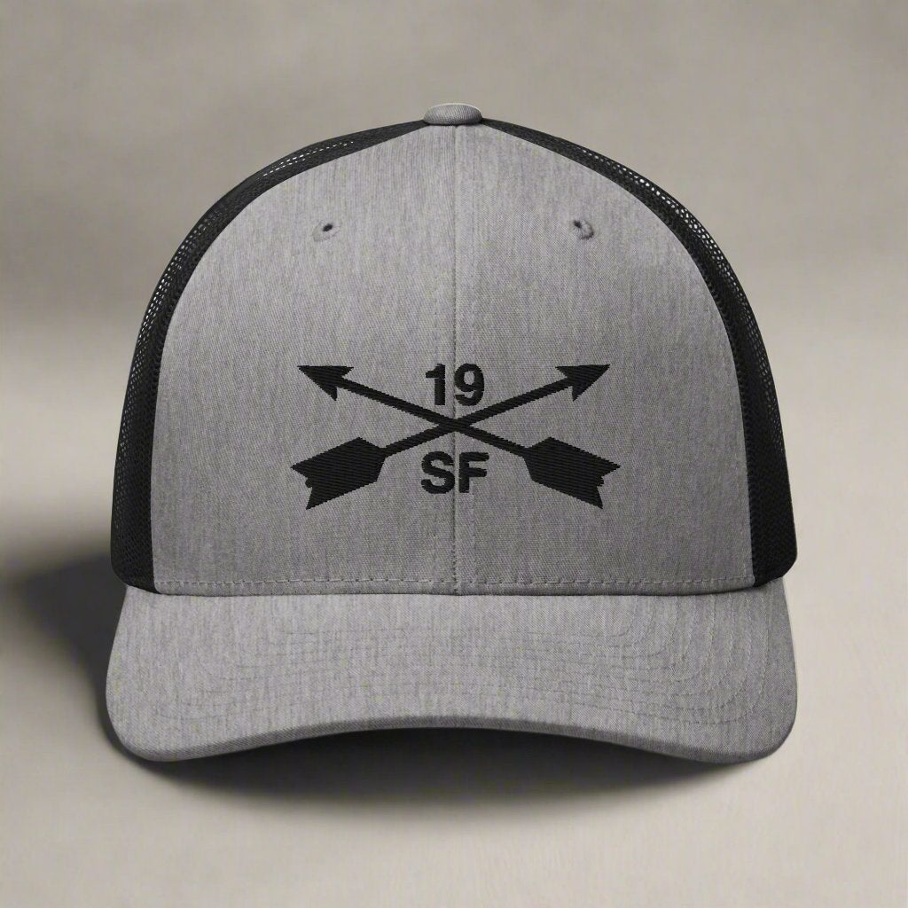 19th special forces group embroidered trucker hat. Embroidery design of two crossed arrows with a 19 above and SF below.