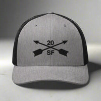 20th special forces group embroidered trucker hat. Embroidery design of two crossed arrows with a 20 above and SF below.