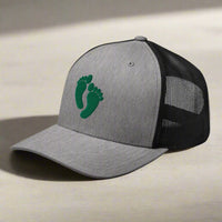 air force pararescue pj green feet embroidered on a snapback trucker hat.