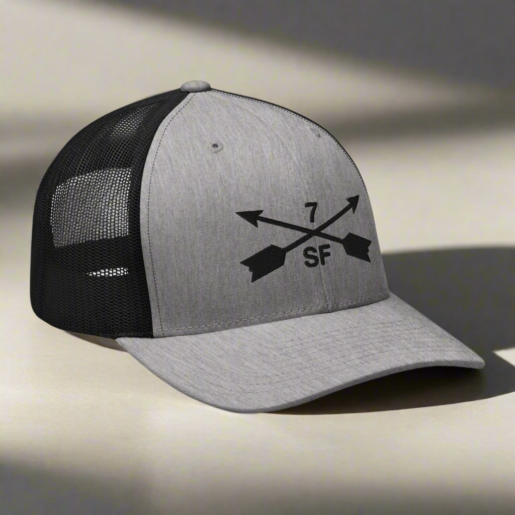 7th special forces group embroidered trucker hat. Embroidery design of two crossed arrows with a 7 above and SF below.