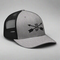 10th special forces group embroidered trucker hat. Embroidery design of two crossed arrows with a 10 above and SF below.