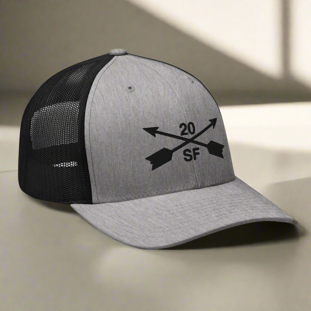 20th special forces group embroidered trucker hat. Embroidery design of two crossed arrows with a 20 above and SF below.