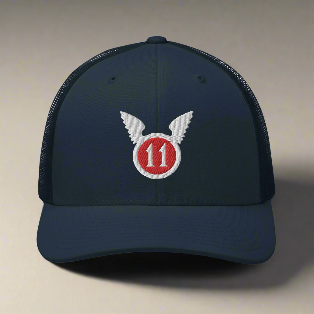 snapback trucker hat embroidered with the 11th airborne insignia.