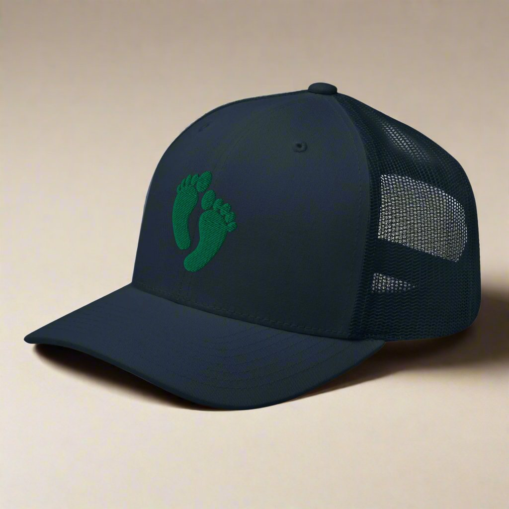 air force pararescue pj green feet embroidered on a snapback trucker hat.