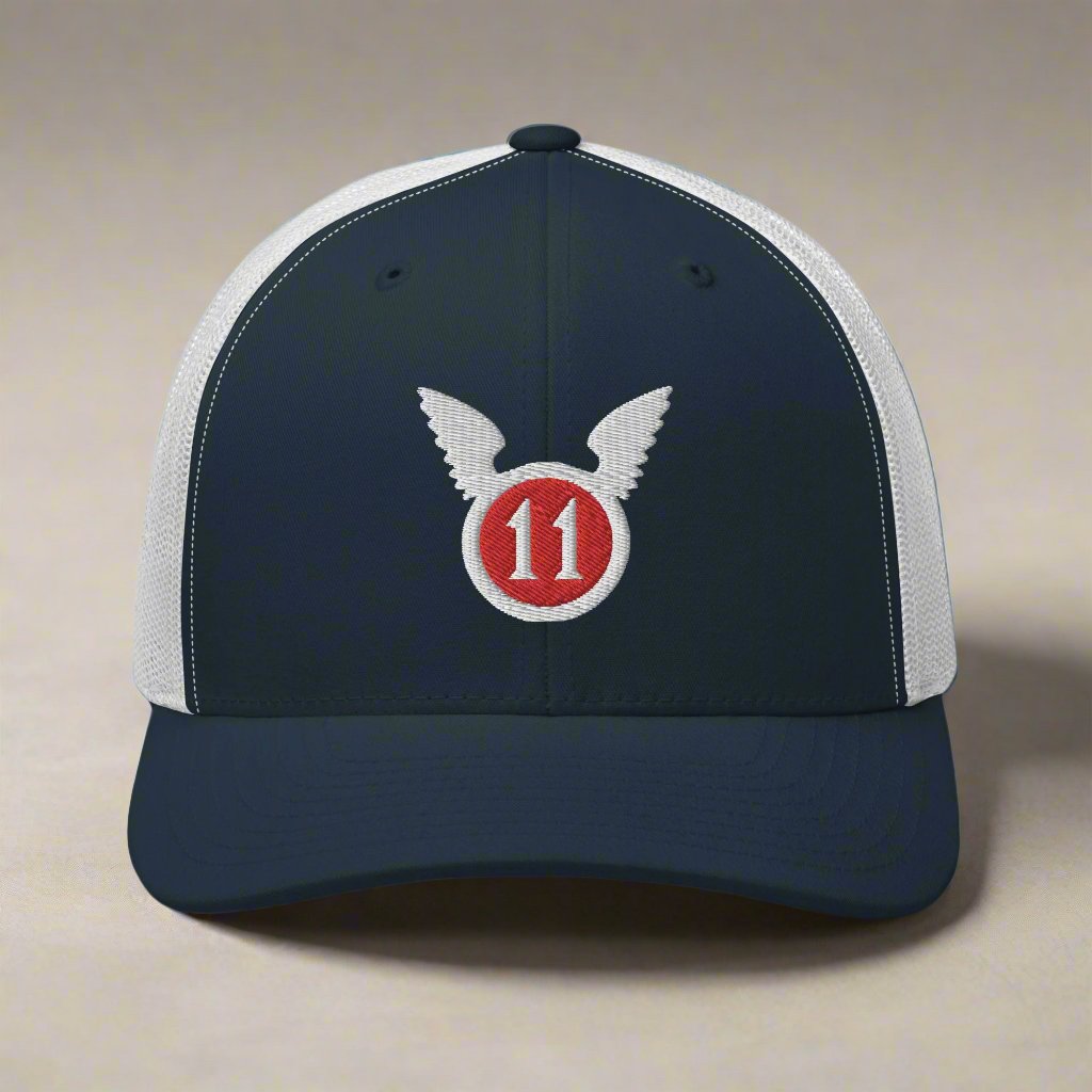 snapback trucker hat embroidered with the 11th airborne insignia.