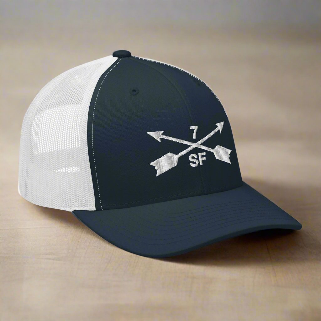 7th special forces group embroidered trucker hat. Embroidery design of two crossed arrows with a 7 above and SF below.