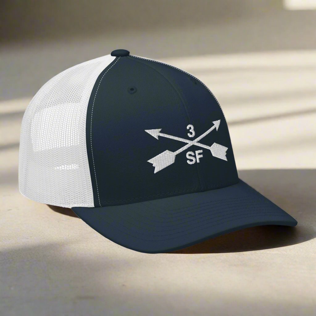 3rd special forces group embroidered trucker hat. Embroidery design of two crossed arrows with a 3 above and SF below.