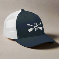 19th special forces group embroidered trucker hat. Embroidery design of two crossed arrows with a 19 above and SF below.