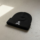 ribbed knit beanie with skull and crossbones 