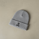ribbed knit beanie with skull and crossbones 