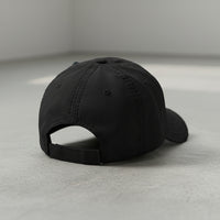 distressed dad hat with skull and crossbones logo