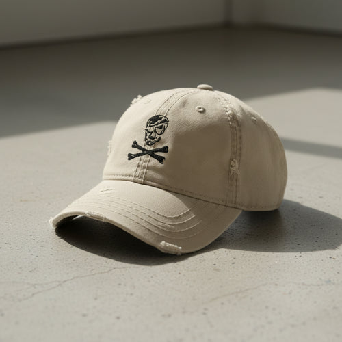 distressed dad hat with skull and crossbones logo