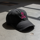 distressed dad hat with skull and crossbones logo