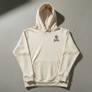 beige hoodie with skull and crossbones design on the left chest