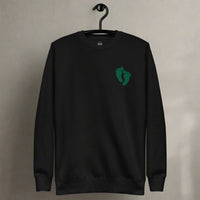 PJ green feet embroidered on a sweatshirt