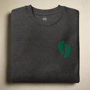 PJ green feet embroidered on a sweatshirt