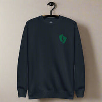 PJ green feet embroidered on a sweatshirt