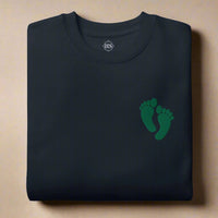 PJ green feet embroidered on a sweatshirt
