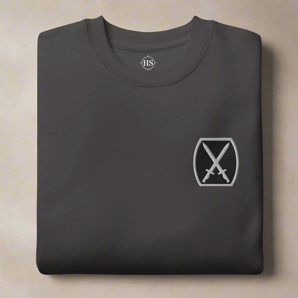 sweatshirt embroidered with 10th mountain black and white insignia. 